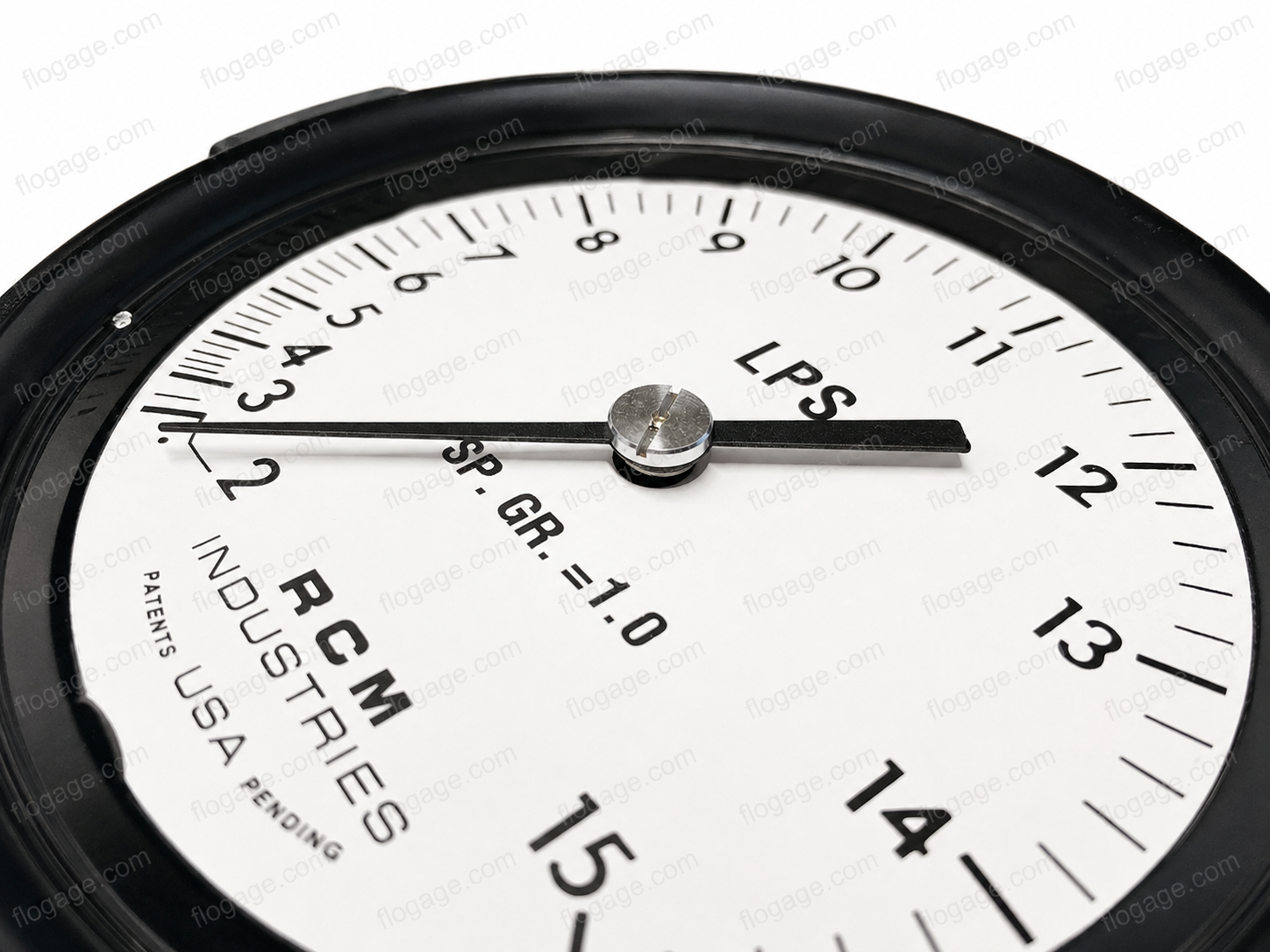 RCM Industries Flo-Gage dial close-up showing GPM scale from 0.5 to 6.0 with pointer at 2.5